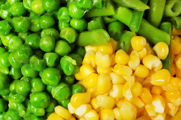 Mix of frozen vegetables as background, top view