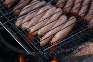 Sausage fire-roasted on the grill