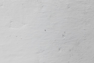 Wall fragment with scratches and cracks