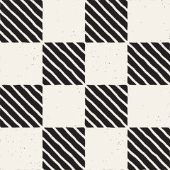 Fototapeta premium Hand drawn seamless repeating pattern with checker lines tiling. Grungy freehand background texture.