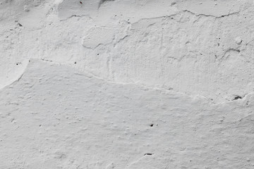 Wall fragment with scratches and cracks