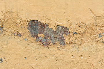 Wall fragment with scratches and cracks
