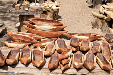 Wooden boats and other items at local wood craft market in Namibia, Southern Africa