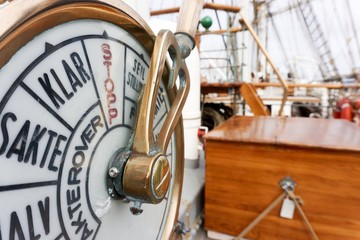 Weathered telegraph on tallship with brass elements