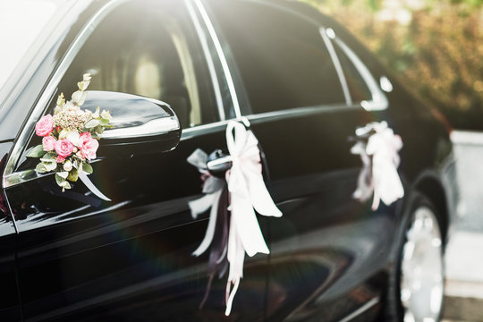 Luxury wedding car decorated with flowers