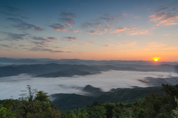 Naklejka premium Beautiful clouds and fog among mountain landscape.
