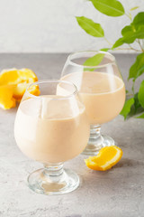 Two cocktail glass with smoothies milkshake healthy drink