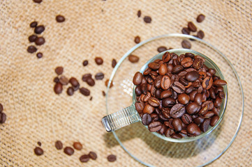 coffee beans in a cup top view, aroma energy drink