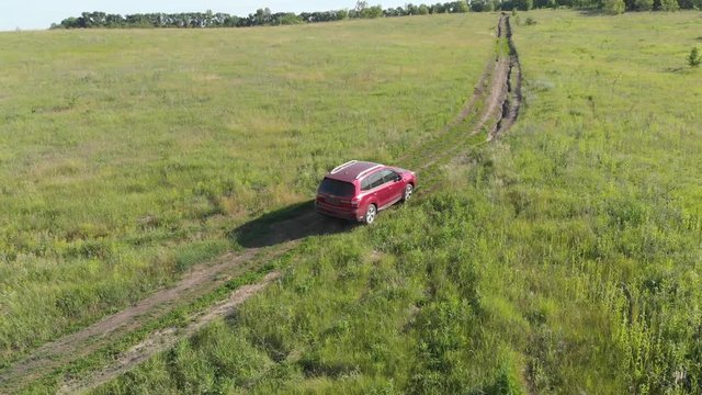 the car is moving over rough terrain. Subaru car forester.