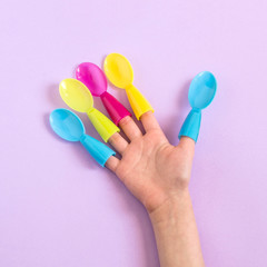 Funny idea for children: hand with fingers-spoons