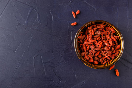 Bowl with goji berries on the table
