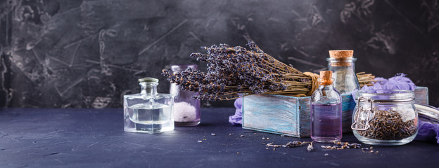 Essential lavender oil and dry lavender flowers.