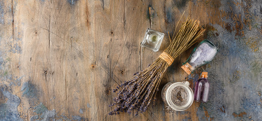Essential lavender oil and dry lavender flowers.