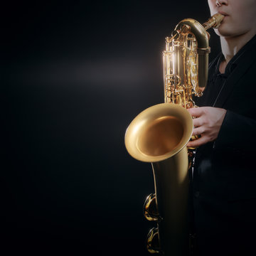 Saxophone player Jazz musician. Saxophonist playing baritone sax