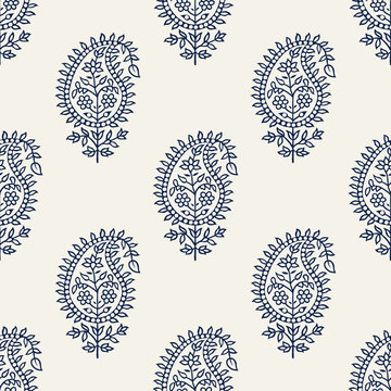 Indigo dye woodblock printed seamless paisley pattern. Traditional oriental ethnic ornament of India, navy blue on ecru background. Textile design.