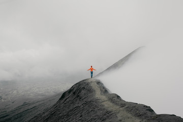 Person walking on mountain path