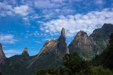 Mountains, clouds and landscape - (God's Finger) Famous brazilian peak in Rio de Janeiro