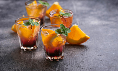 Summer  drink with orange and berries