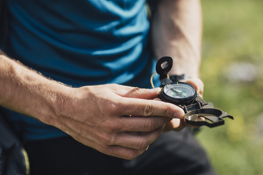 Hiker Using Compass