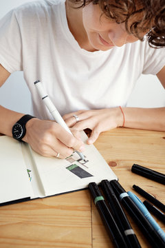 Woman working on design plan