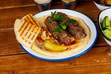 Delicious hummus with kebab