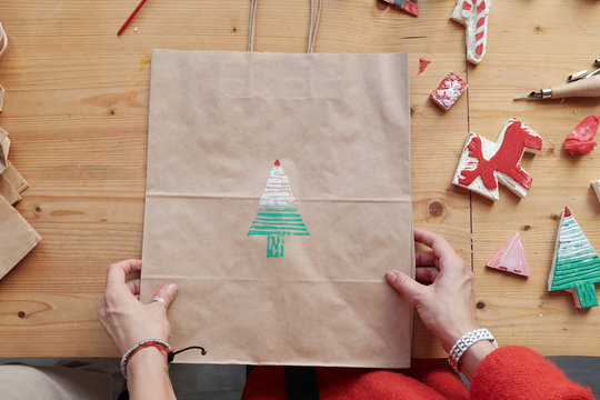 Designer with holiday bag
