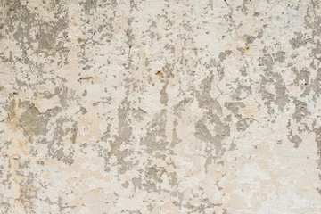 Fotobehang Verweerde muur Muurfragment met krassen en scheuren