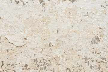 Wall fragment with scratches and cracks