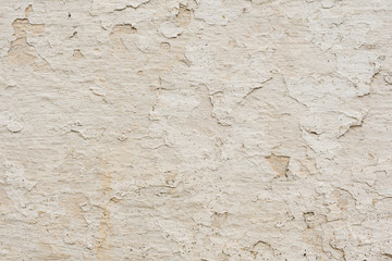 Wall fragment with scratches and cracks