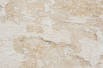 Wall fragment with scratches and cracks