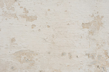 Fototapeta premium Wall fragment with scratches and cracks