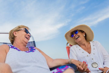 Senior women having fun at the beach