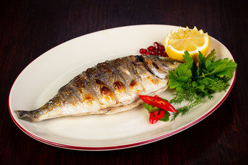 Grilled dorada served lemon