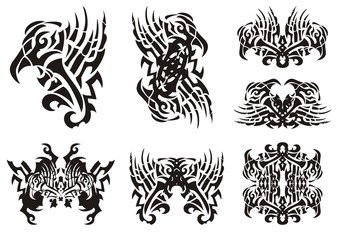 Tribal unusual black and white eagle symbols. Abstract peaked eagle symbol with an open wing and the butterflies formed from him, a frame and double symbols