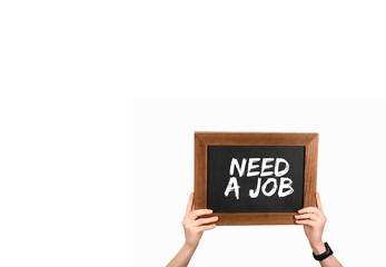 Woman holding chalkboard with inscription need a job isolated on white
