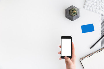 Hand holding smartphone 