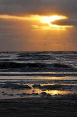 Landscape of the setting sun against the North sea in the Netherlands city of Zandvoort