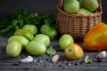 Green tomatoes in a basket.