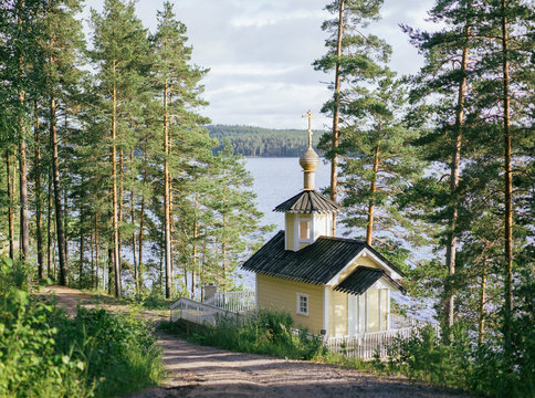 Small church on shore of lake