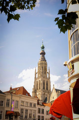 Fototapeta na wymiar High Bell Tower of the Church of Grote Kerk in Breda