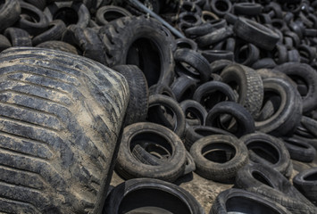 Heap of used tyre outdoor
