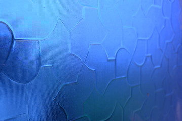 Blue sky glass with a structure on a light background