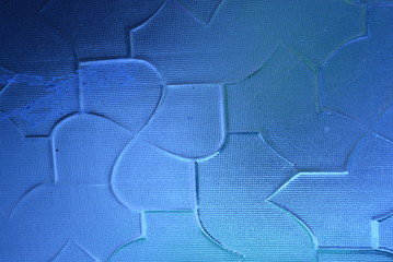 Blue sky glass with a structure on a light background