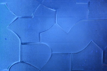 Blue sky glass with a structure on a light background