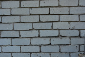Bricks, brickwork of white brick and cement
