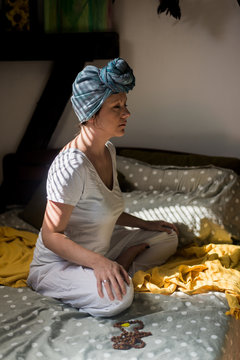 Woman doing kundalini yoga and chanting some mantra