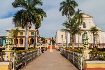 TRINIDAD, CUBA - FEB 8, 2016: Tourists at Plaza Mayor in the center of Trinidad, Cuba.