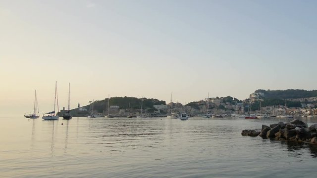 4k time lapse of sunset over the Mediterranean Sea at Port de Soller on the coast of Mallorca