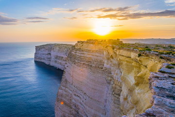 Sunset view over Ta Cenc cliffs on Gozo, Malta - obrazy, fototapety, plakaty