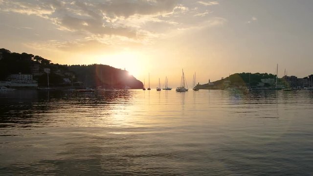 4k time lapse of sunset over the Mediterranean Sea at Port de Soller on the coast of Mallorca